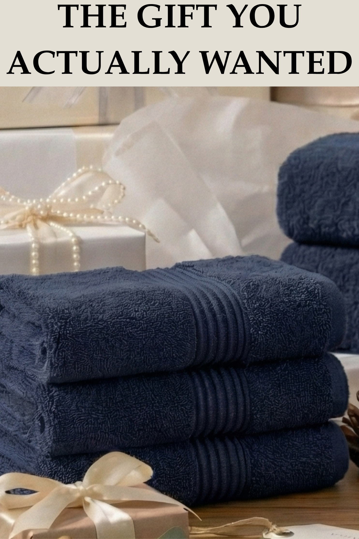 Stack of navy blue towels with a decorative bow on a wooden surface.