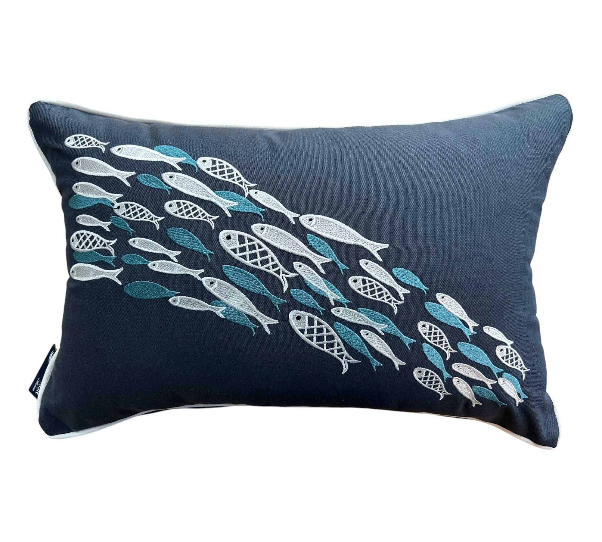 Aqua Dance decorative pillow in azure color, measuring 14 x 20 inches (35 x 50 cm), featuring three overlapping teal fish-shaped embroidery designs on a rectangular blue fabric. Designed for life at sea, it combines durability, elegance, and a tranquil marine-inspired aesthetic.