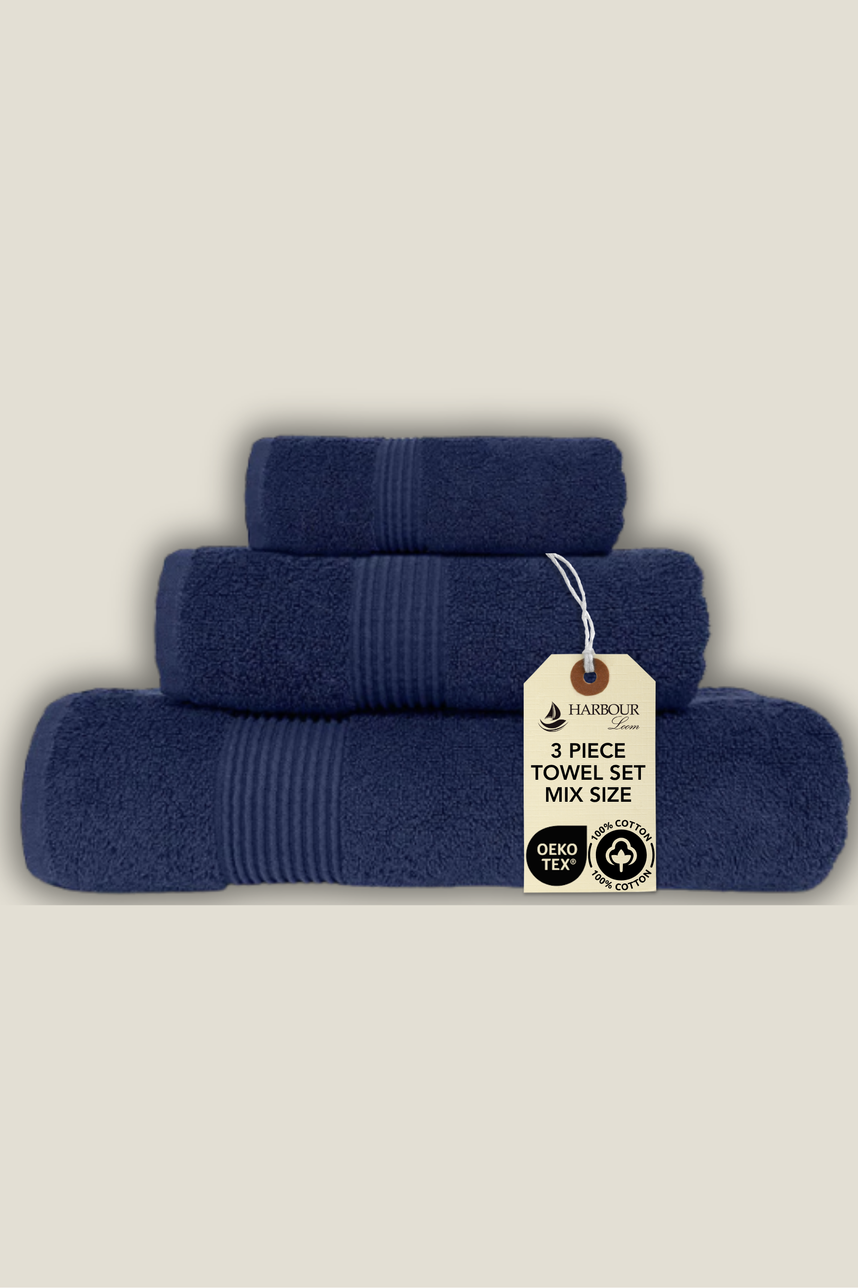 Set of three blue towels with a tag on a beige background