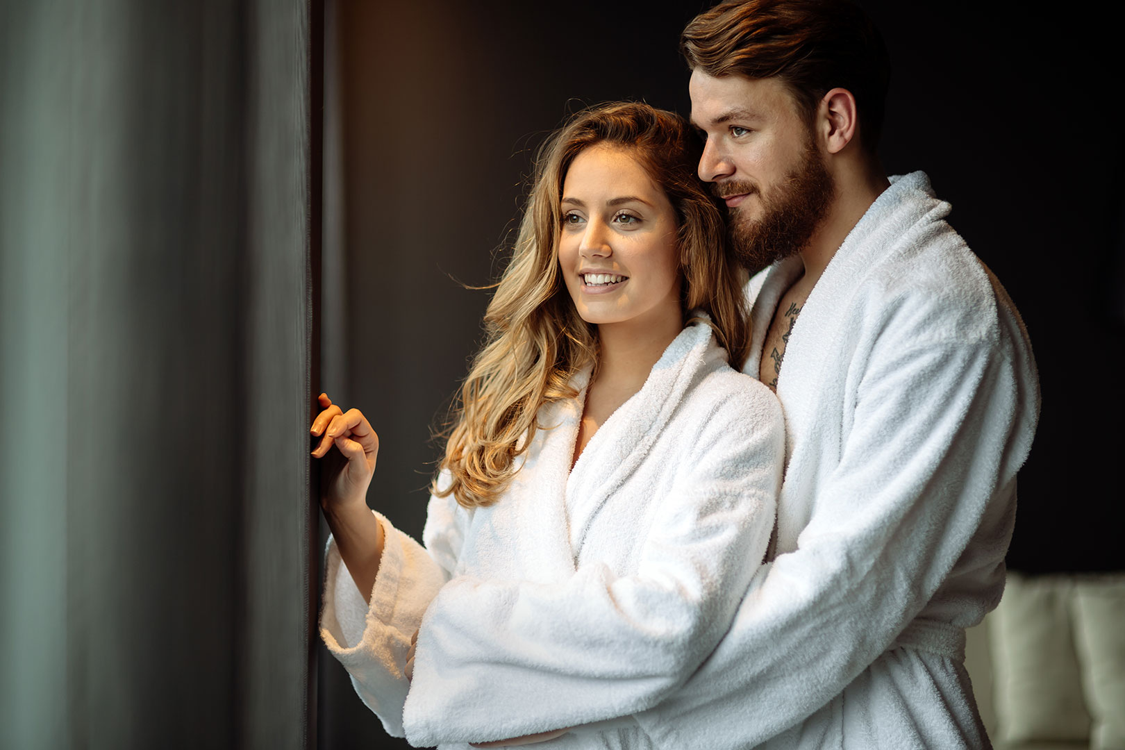 Couple relaxing in luxurious spa and hotel-quality bathrobes, showcasing Harbourloom’s premium bath towels and bathrobes designed for ultimate comfort and style