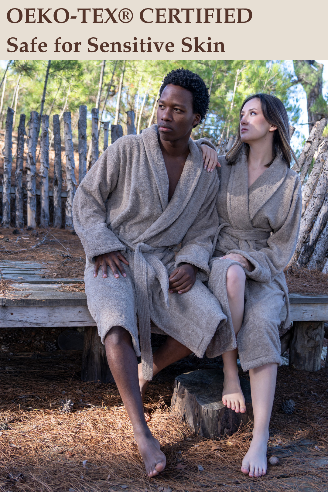 Two people wearing OEKO-TEX certified robes sitting outdoors.