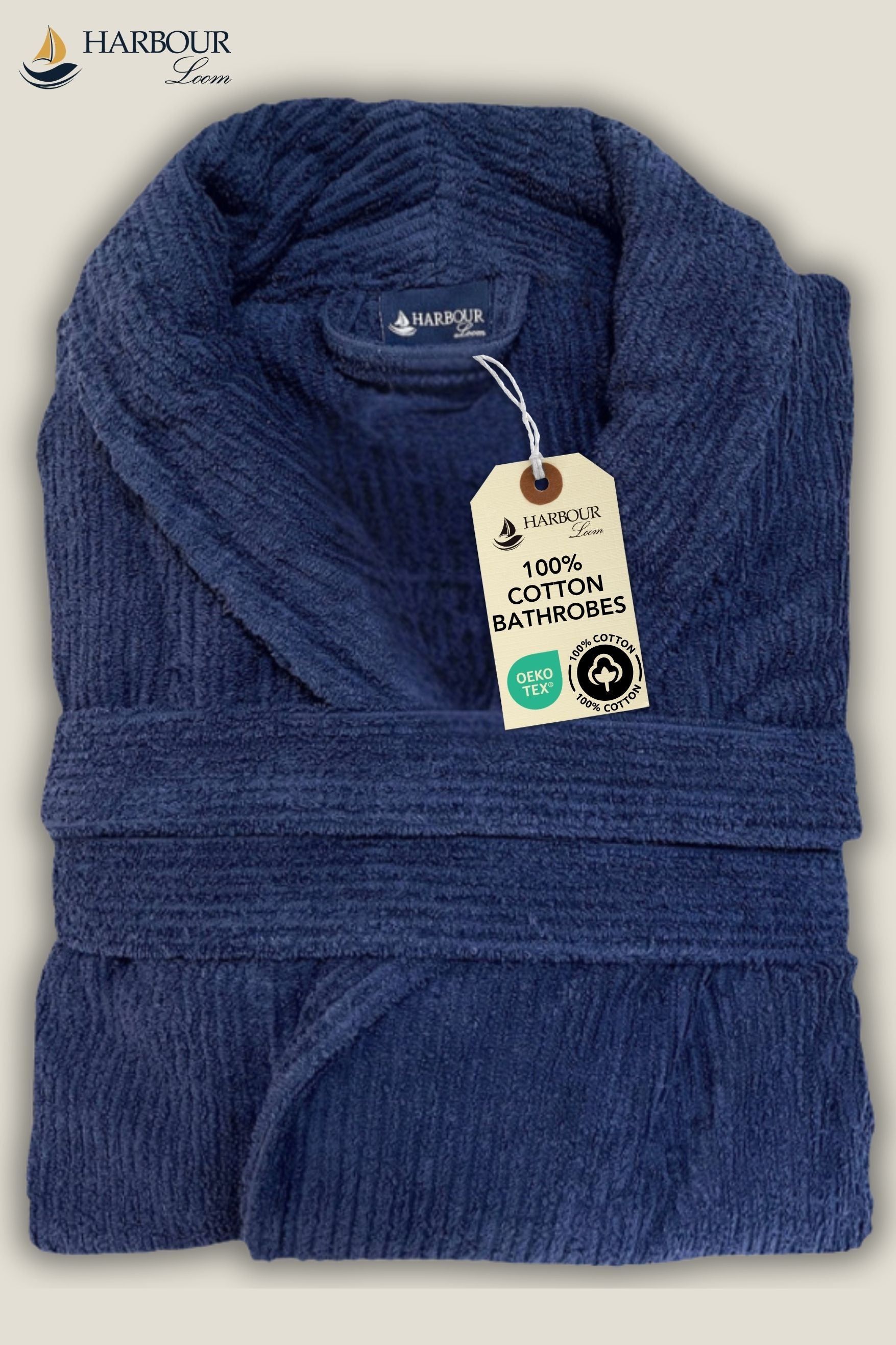 Folded navy blue 100 percent Turkish cotton bathrobe with Harbour Loom tag and Oeko-Tex certification.