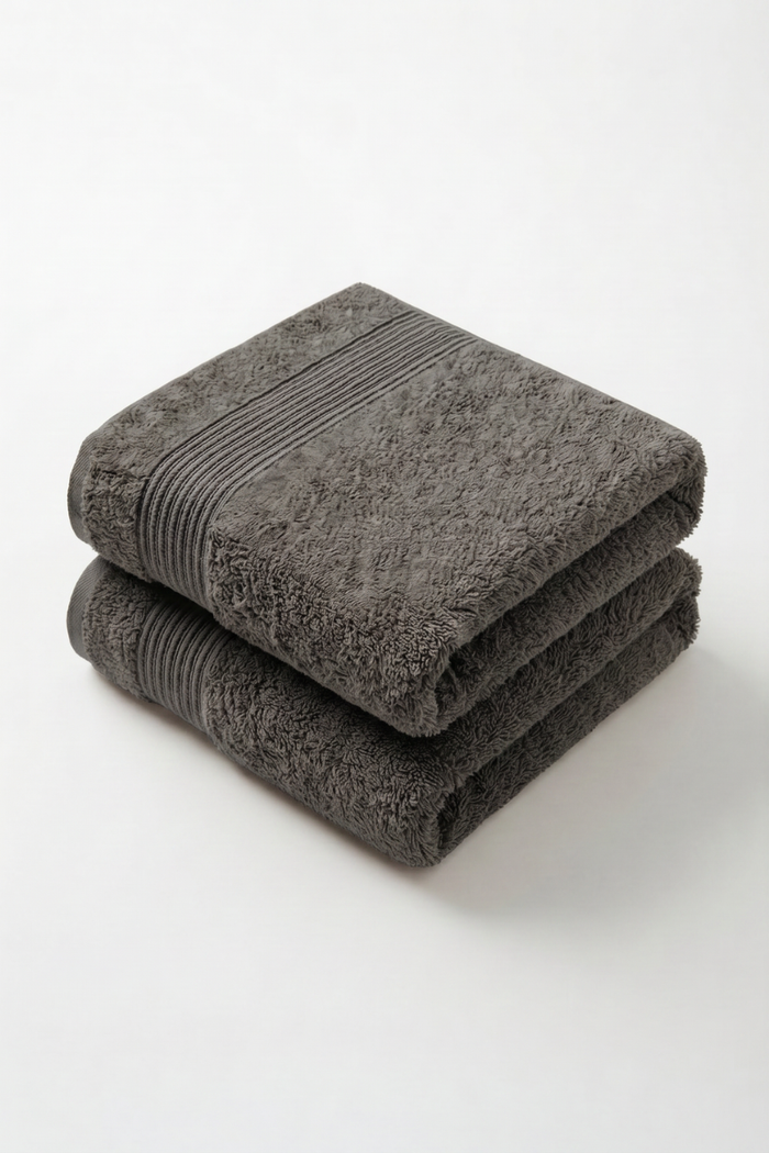 Stack of two Silver grey Turkish cotton bath towels, 600 GSM, with ribbed dobby border